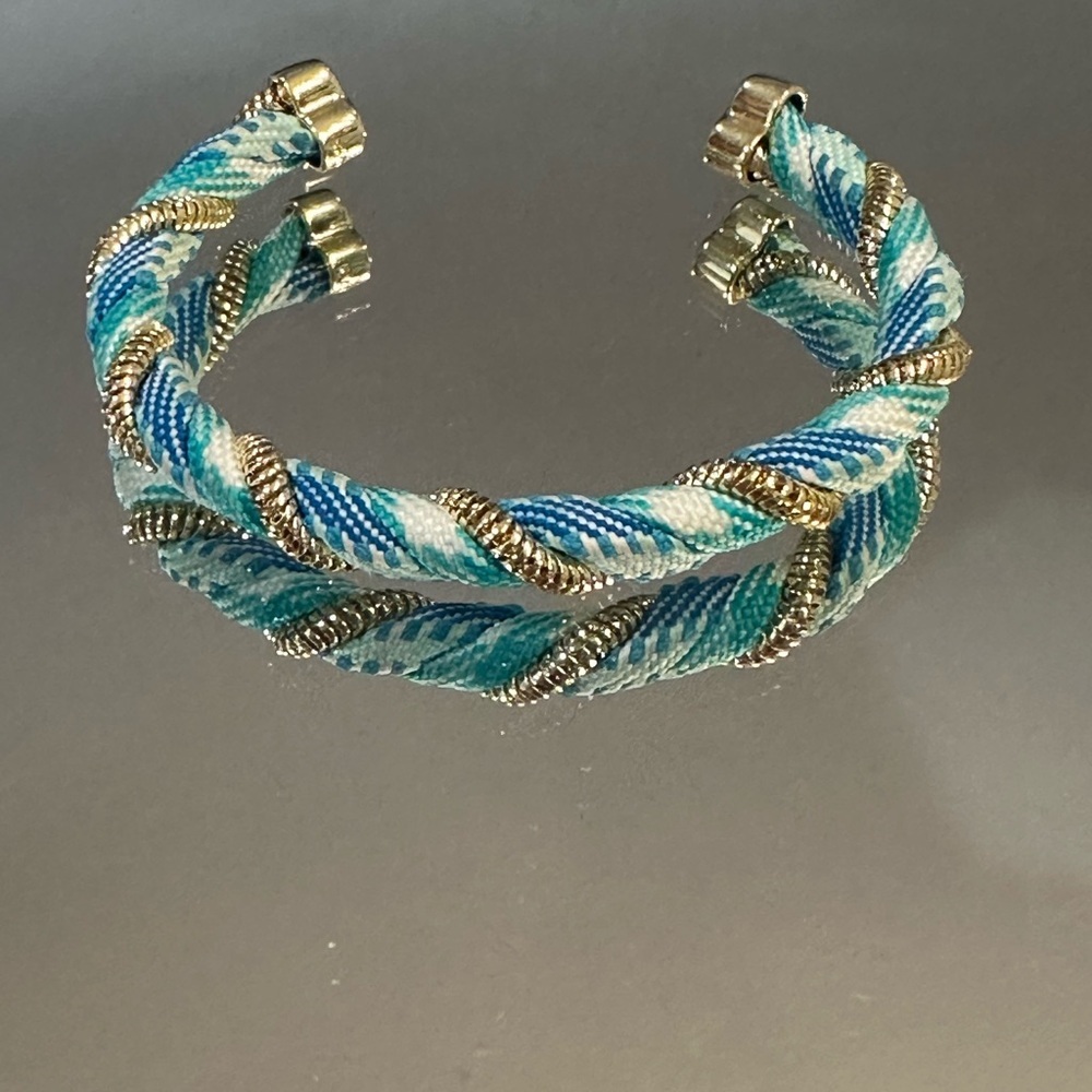 Kendra Scott. Blue and Green Bracelet with gold spiral.